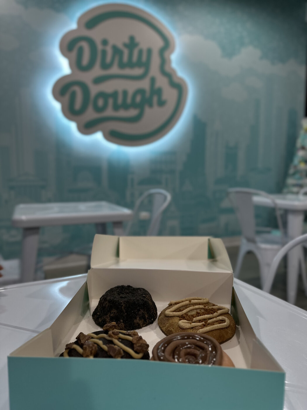 Boxed Dirty Dough cookies photographed in-store